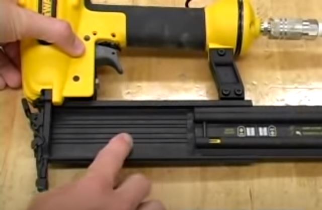 How to load a brad nail gun?